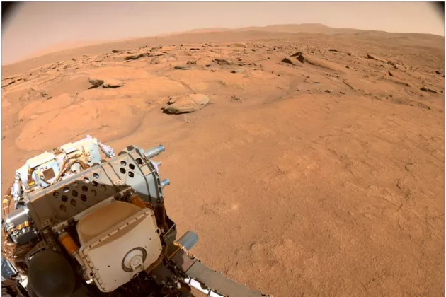 Mars jordyta med ett mätinstrument längst till vänster.